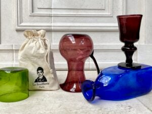 olive-colored-drinking-glass-raspberry-colored-pitcher-carafe-rapberry-colored-wine-glass-blue-pitcher-carafe