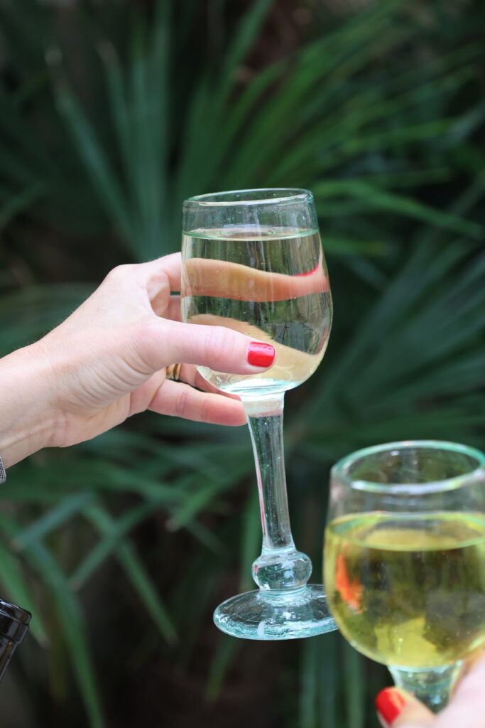 hand-holding-sassy-sauvignon-wine-glass