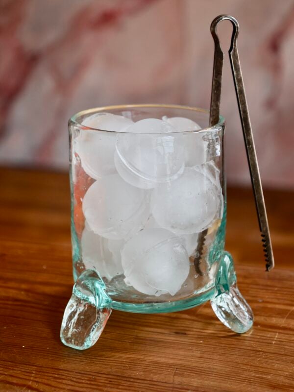 hurricane-vase-with-3-feet-transparent-mouth-blown-recycled-glass