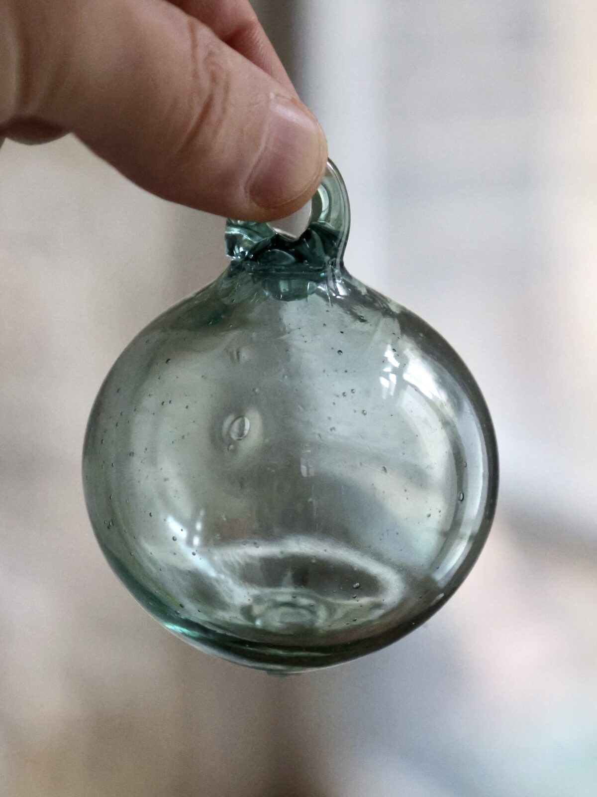 Hand-blown christmas ball using recycled glass